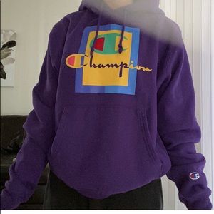 A champion sweatshirt with some small marks on it